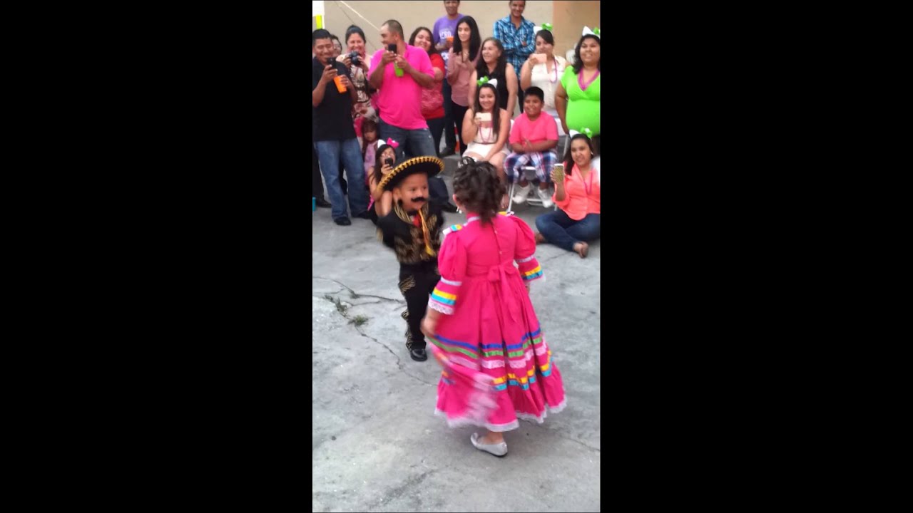 Kids dancing jarabe tapatio mariachi