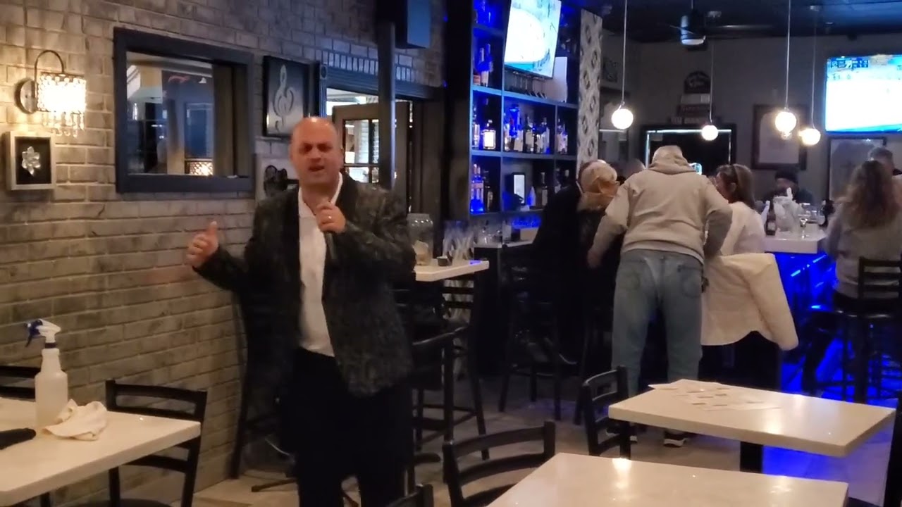 MR. RON SINGING 