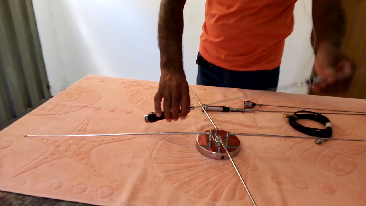 antena 5/8 veicular adaptada para antena de base. Base artesanal