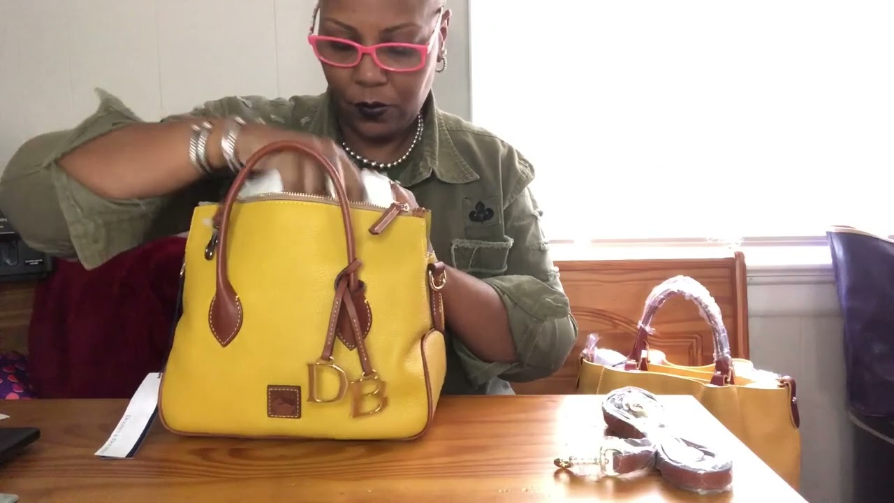DOONEY & Bourke Brenna and Dooney & Bourke Pebble Leather Satchel. The ends and out of each bag