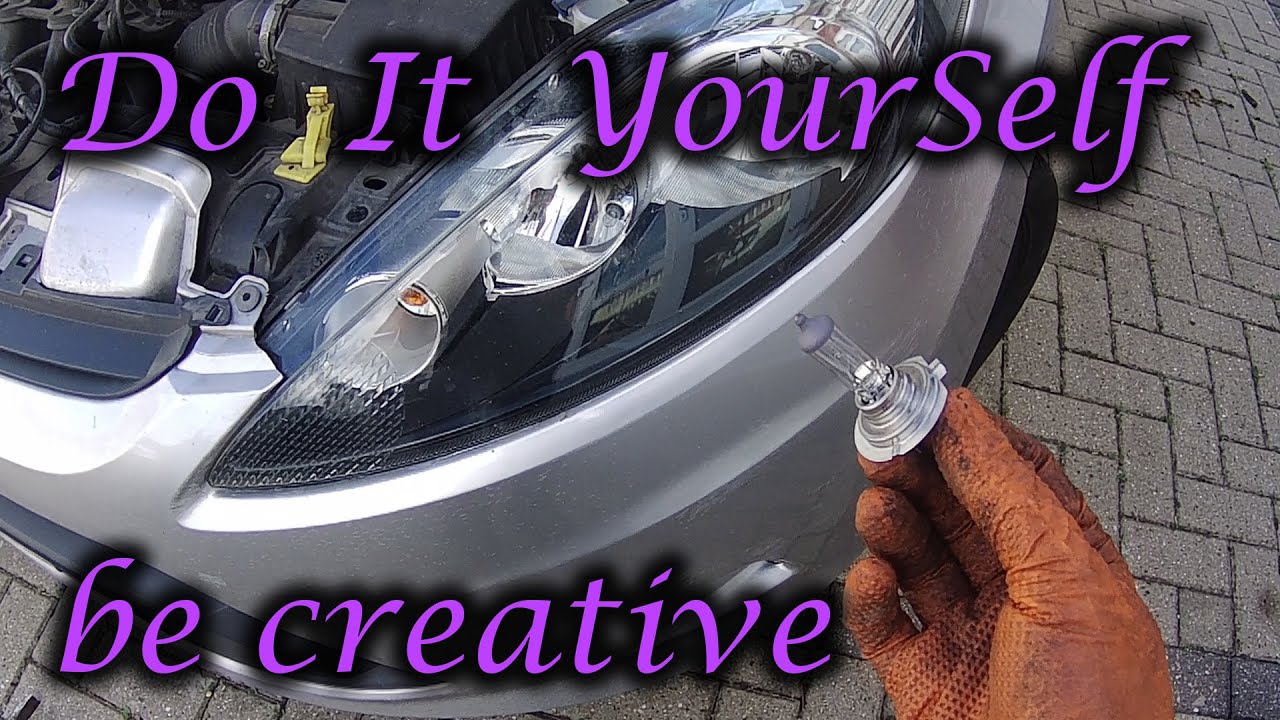 how to change headlight bulb Ford fiesta