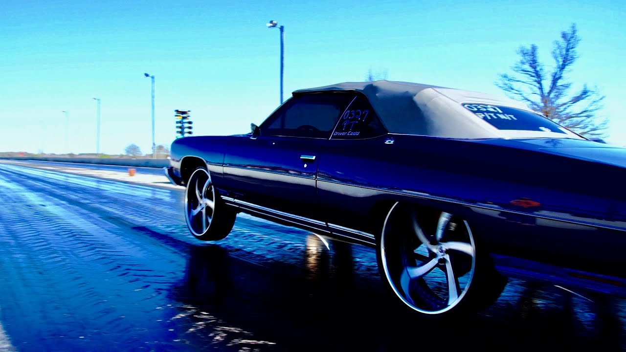 THE BLUE MAGIC TWIN TURBO DONK LEFT WITH THE 26S IN THE SAIR AND FADED!
