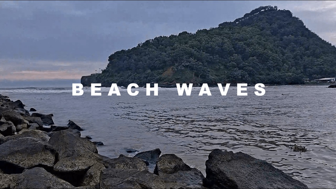 Tranquil Beach Waves: Serene Views of Stones, Mountains & Calm Surf | Ocean Rain Wave