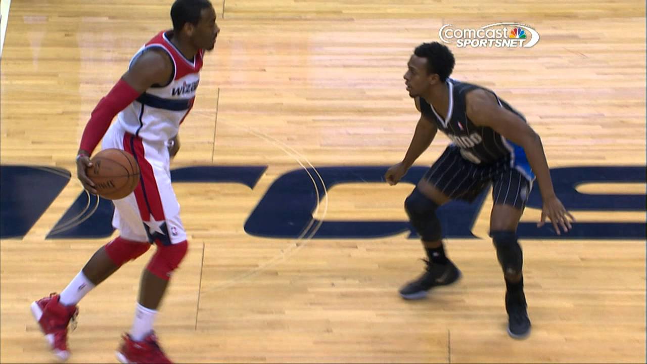 John Wall's ankle-breaking crossover & dish!