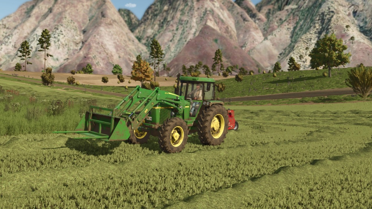 Mowing and making hay bales on grandpa's ranch