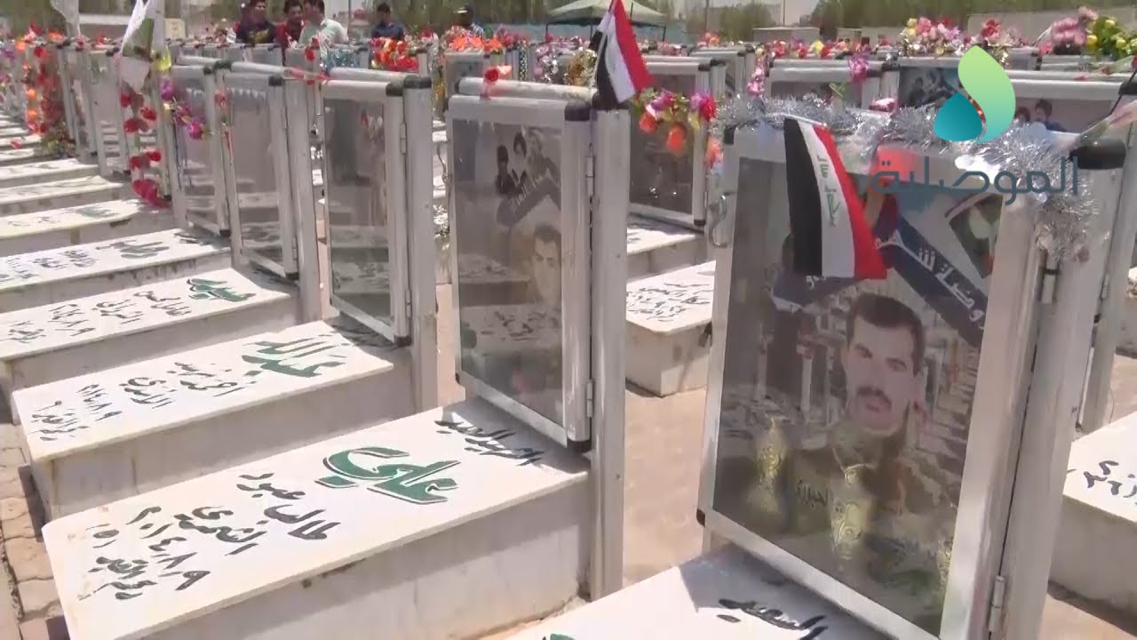 قافلة الحرية القادمة من الموصل تزور مقبرة الشهداء في النجف