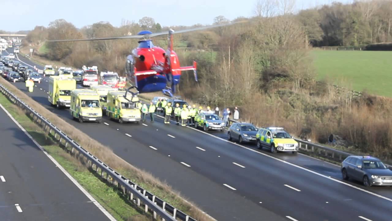 Air Ambulance taking off from the M5 at Tiverton