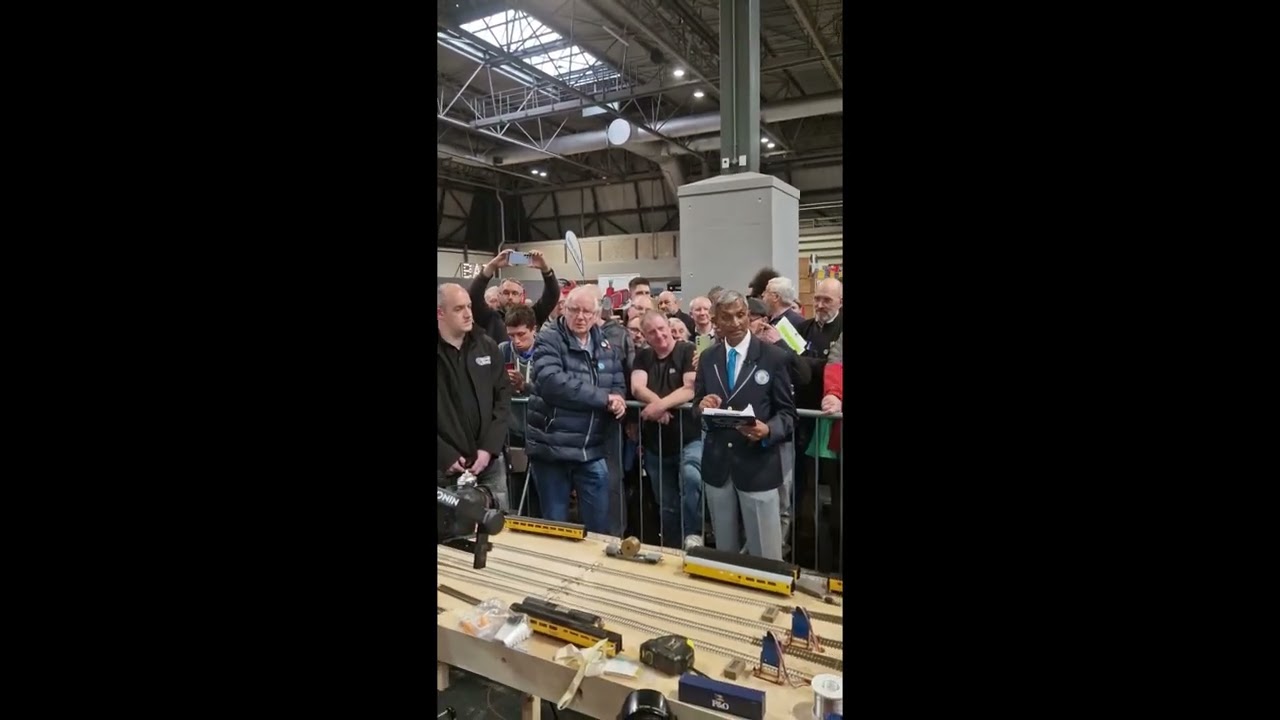 Behind the barriers - Pete and the Railnuts are presented with the World Record!
