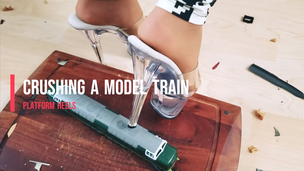 Sporty girl crushes model train #heels #crush #shoes #asmr