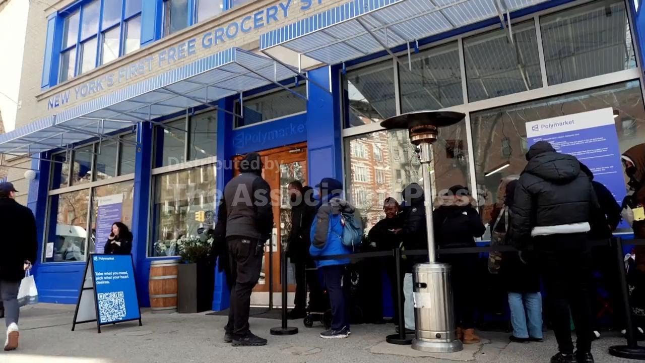 Hundreds queue for free groceries at a prediction market startup’s campaign store in Manhattan