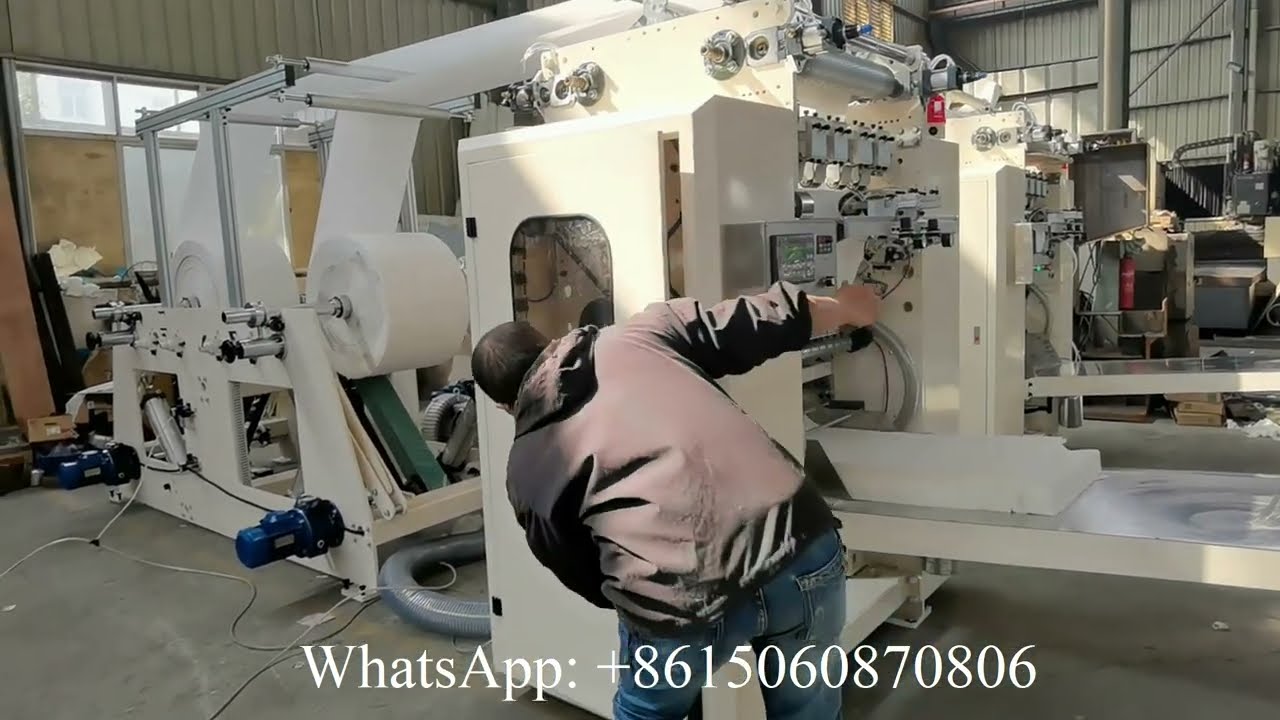 Low cost automatic V folding facial tissue paper making machine