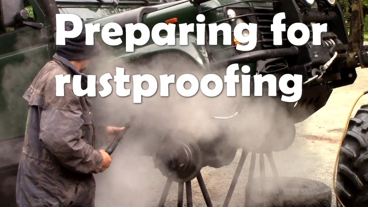 Power washing the 110 Defender ready for new rustproofing  - not a nice job!