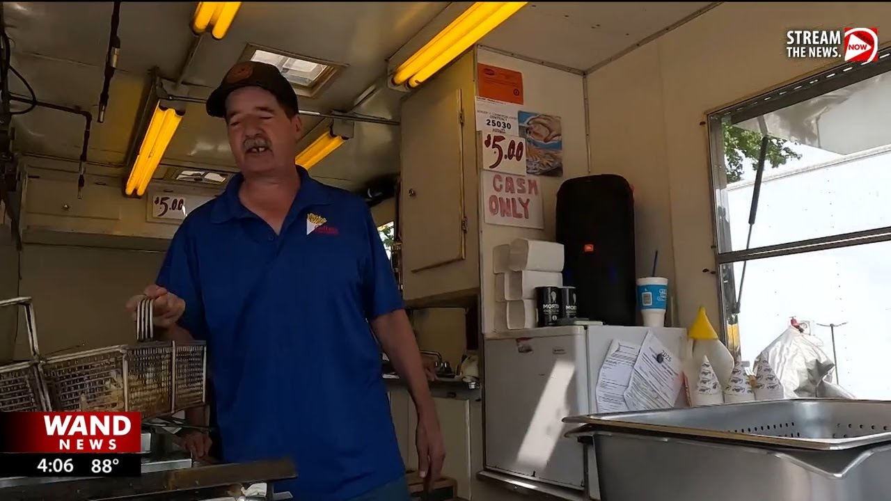 Ben tries different foods at the Illinois State Fair