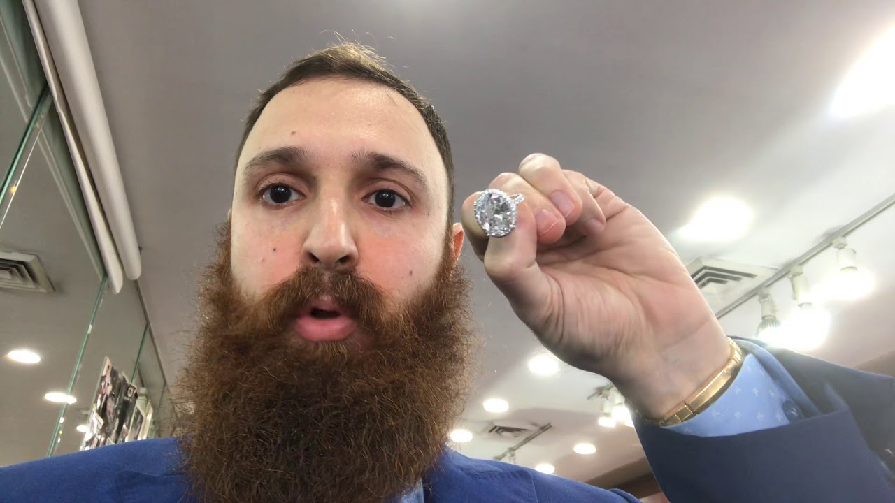 What does a 13 karat plus oval diamond look like in a ring.