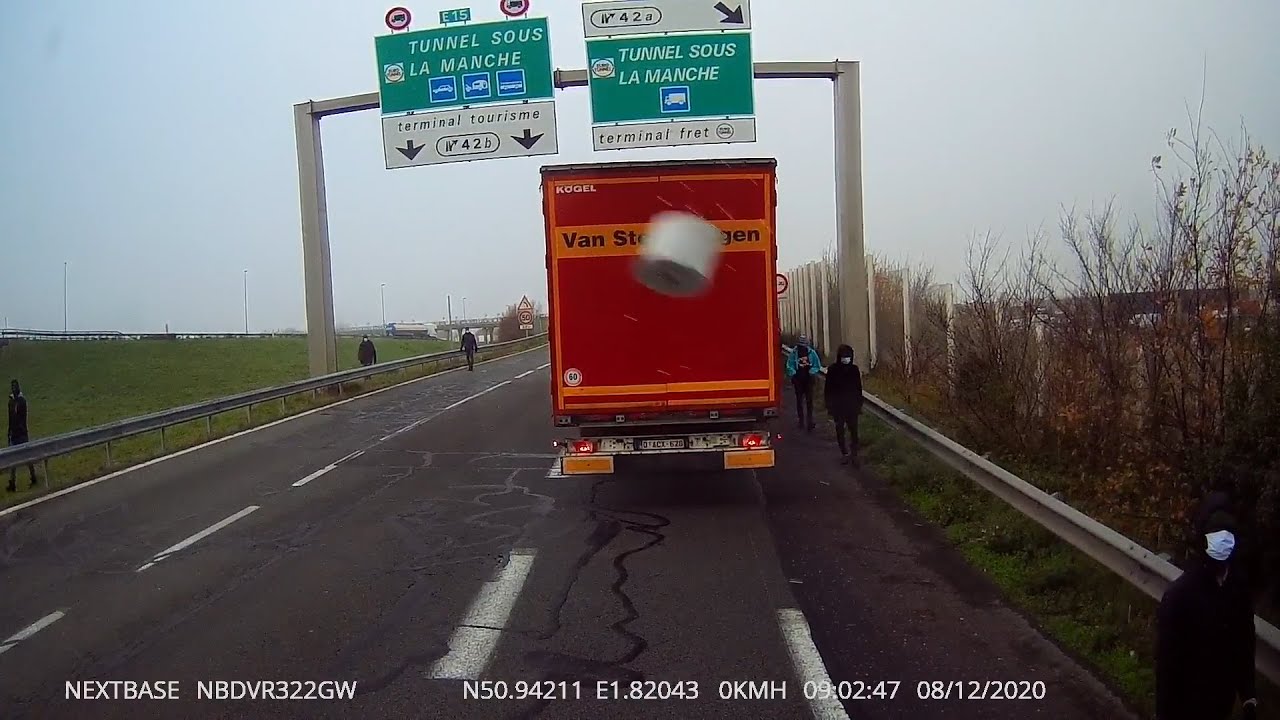 Footage appears to show migrants attacking truck at Calais border