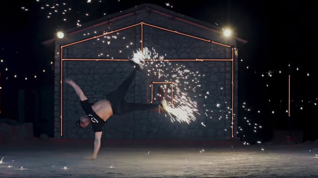 B-Boy Wing, Lil Amok, and Popper Dassy Lee dances with Fireworks for the New Year