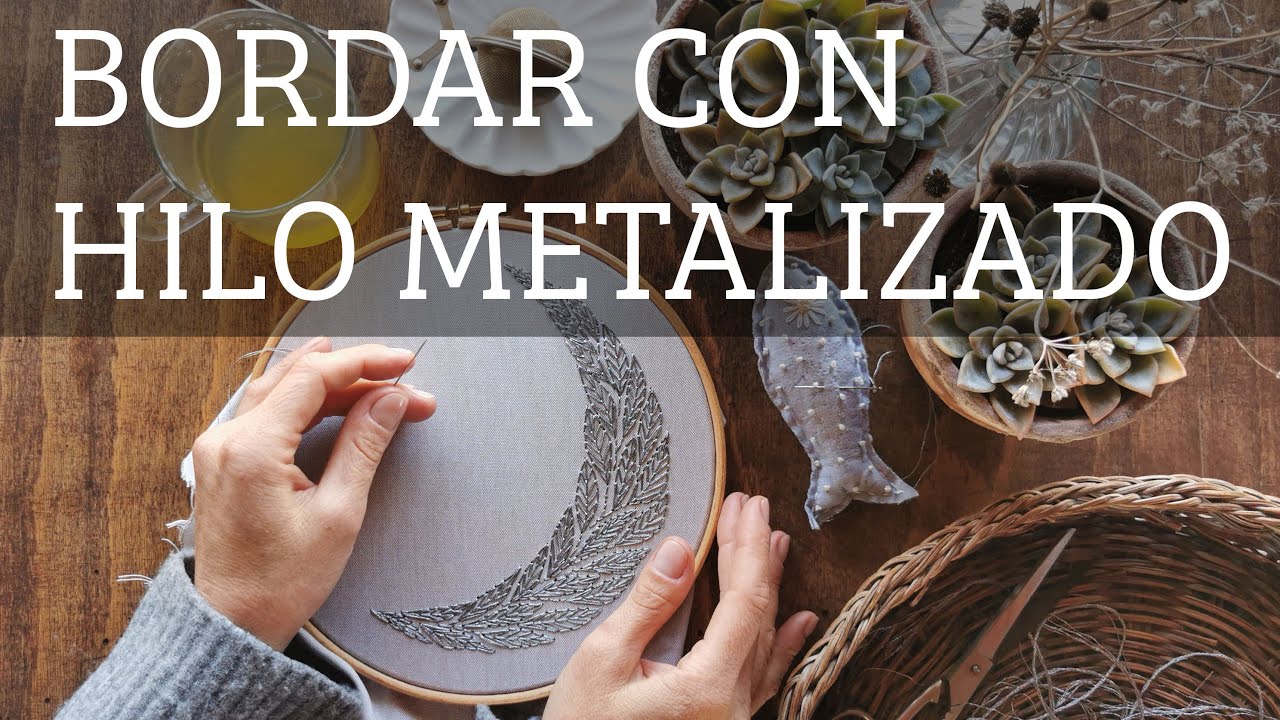 Bordar con hilo metalizado. Luna bordada. Mouliné metalizado.