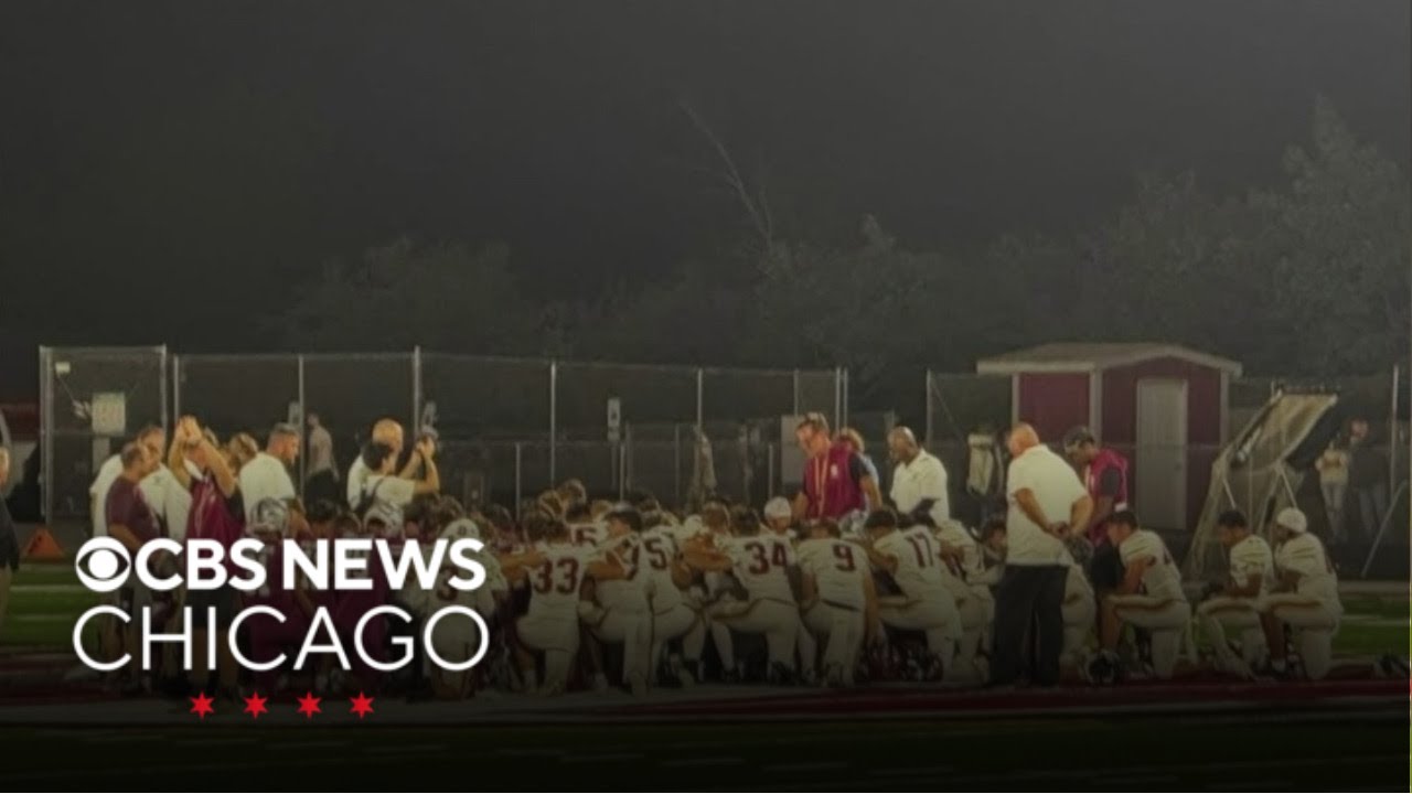 Schaumburg high school football team wears red, gold in support of injured player