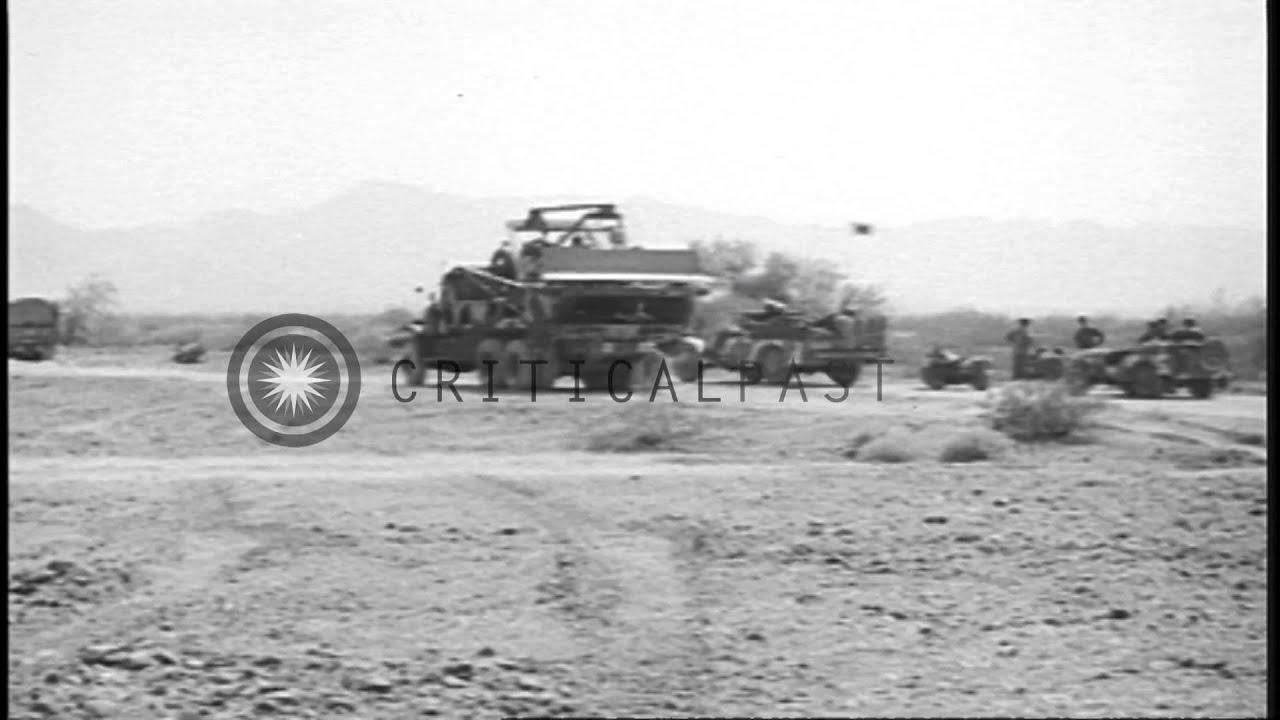US Army IX Corps bulldozer and road grader in operation, and a convoy moves along...HD Stock Footage