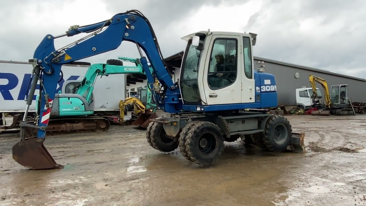 1272  Liebherr A 309 Litronic
