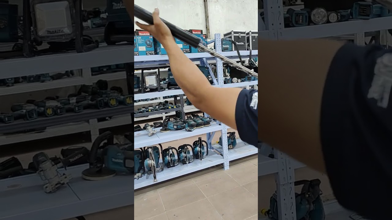 Makita UN001G - Makita Cordless Angle Pole Hedge Trimmer