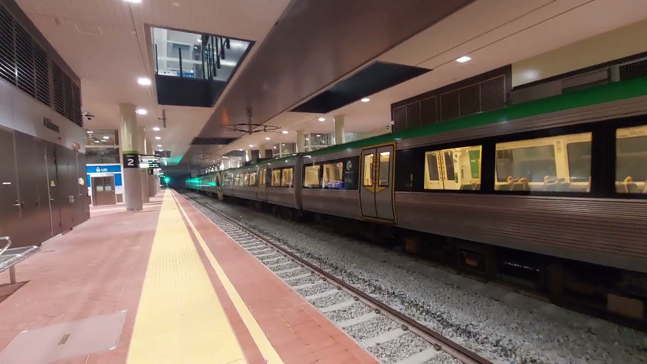 2 Transperth B series arriving and departing Alkimos station