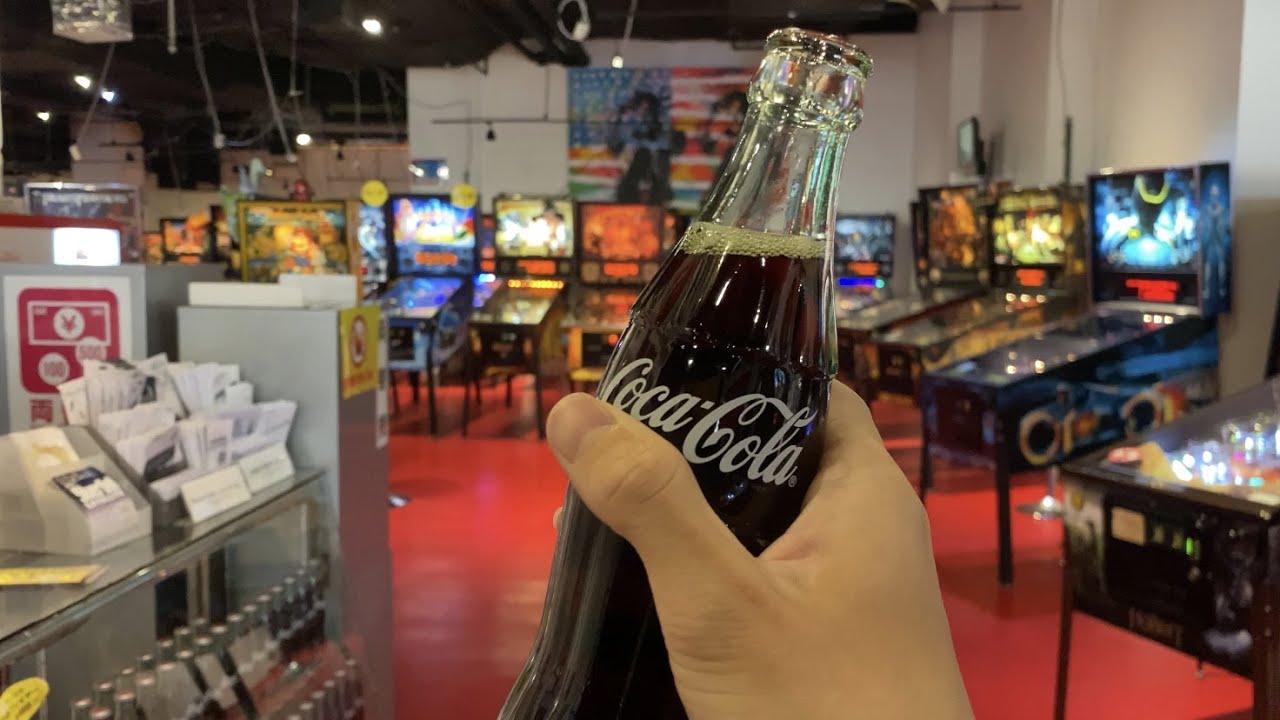 Vintage Coca-Cola Vending Machine at Amusement Arcade in Japan