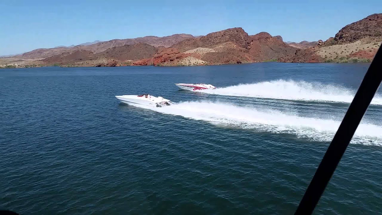 Helicopter casing two 40' Skaters at Lake Havasu