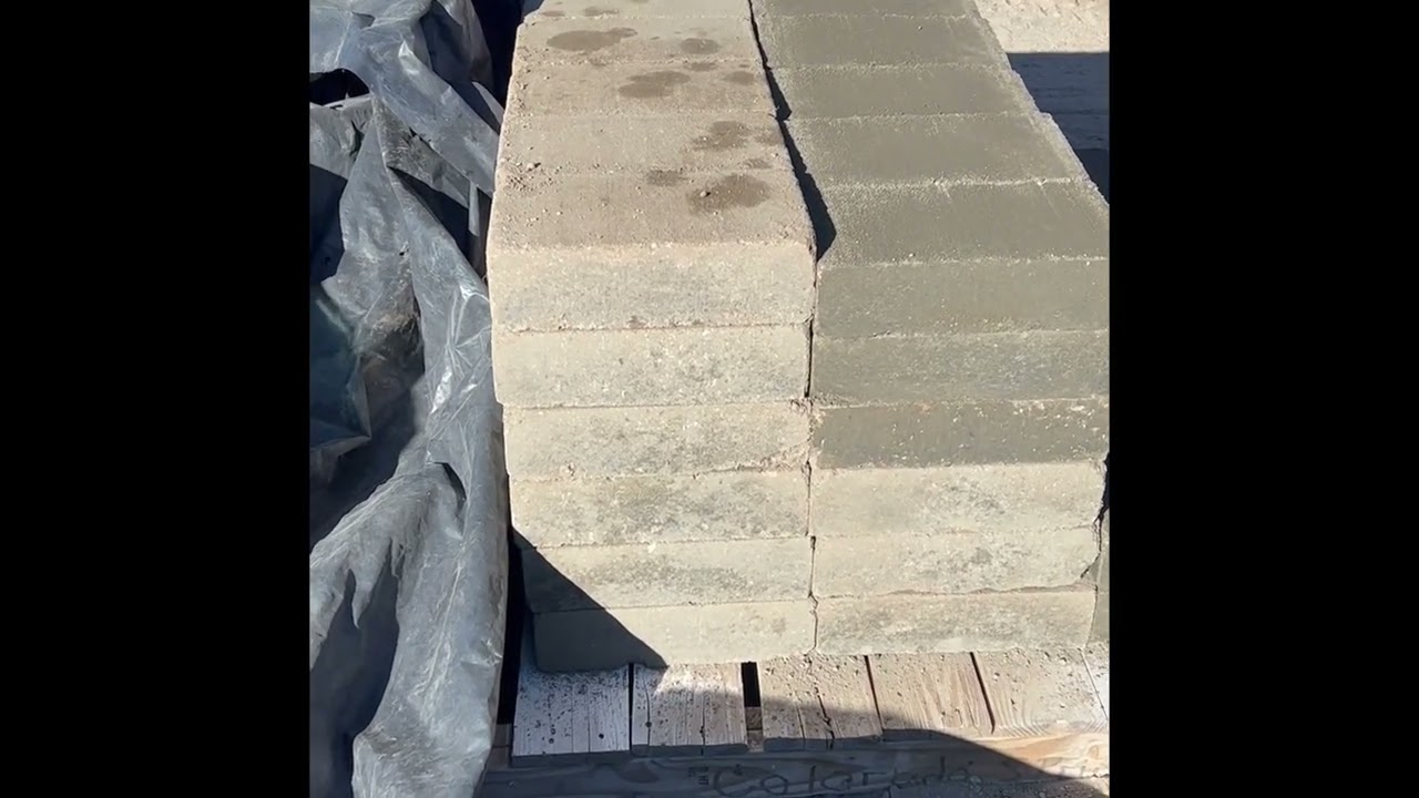 Producing 12%-cement compressed earth blocks to be used as driveway pavers