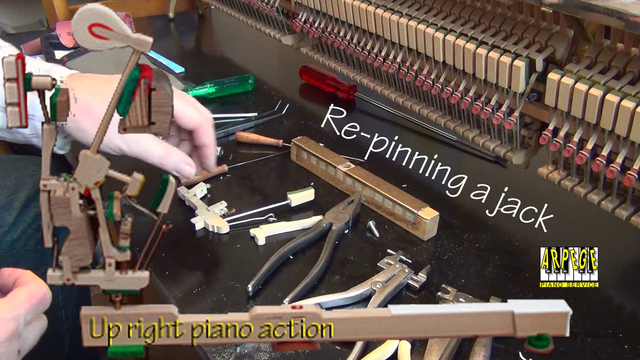 Re-pinning a piano action jack