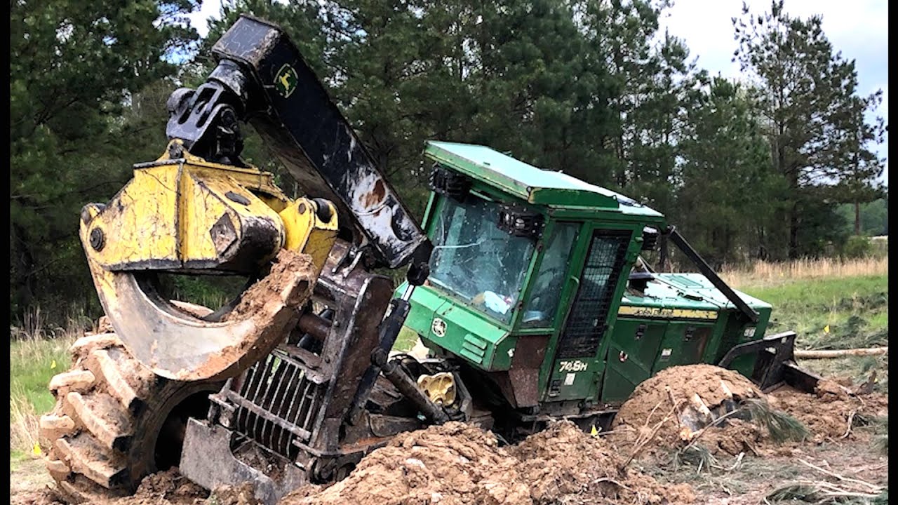 Worst stuck equipment! This logging skidder required a CRANE for removal!