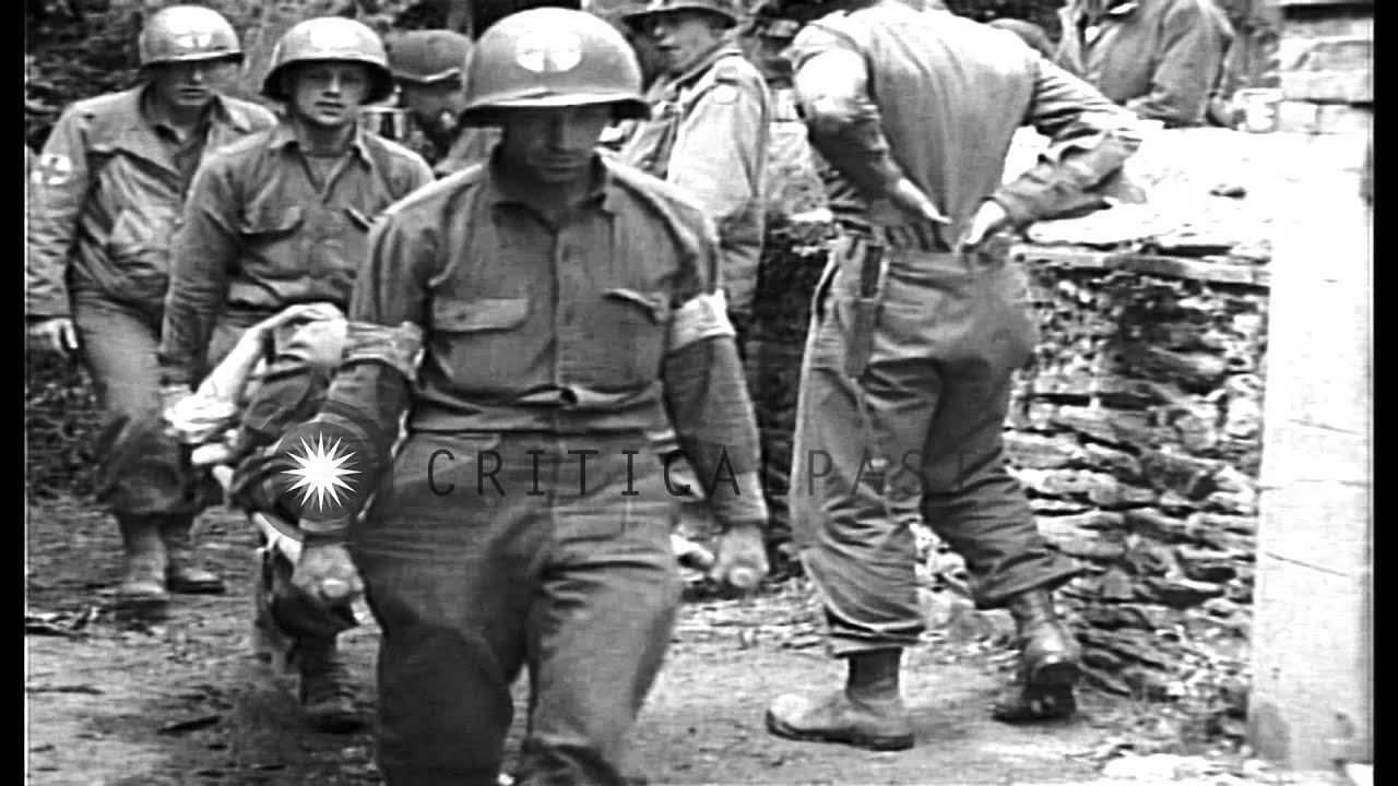 United States 35th Infantry Division soldiers enter St. Lo, France during World W...HD Stock Footage