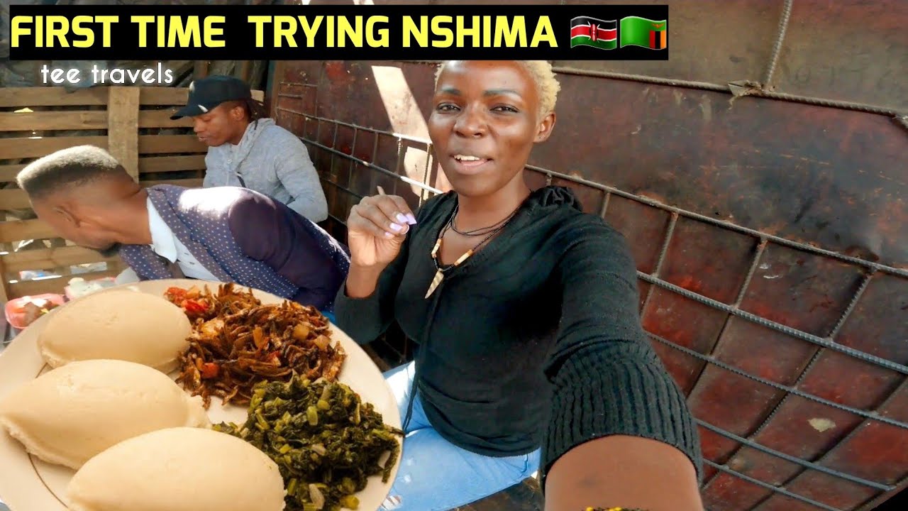 Kenyan  Joining  Zambian locals for Street Lunch