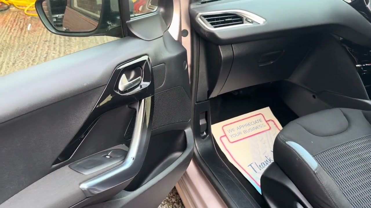 Peugeot 208 Allure Automatic with £20 tax for a year in Pink.