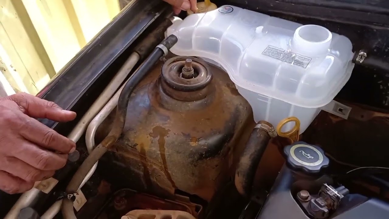 Como trocar o reservatório de água do Ford fiesta!