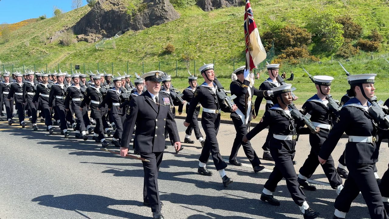 First time Royal Navy march into Holyrood Palace as Royal Guards, supported by Scots Guards Pipes