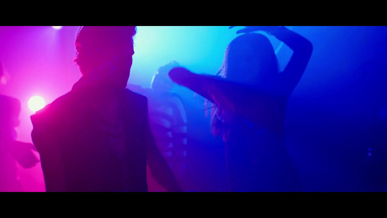 "White Bird in a Blizzard": Behind the wheel.