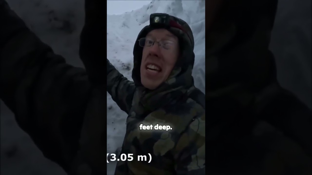 Building a shelter by removing 400 cubic Feet of snow.
