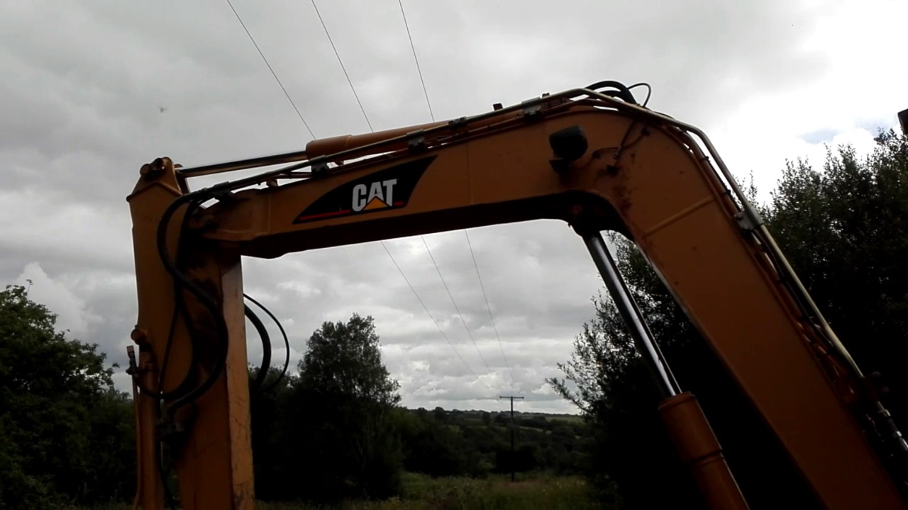 Searching for a old water well with a Cat 307 b excavator.