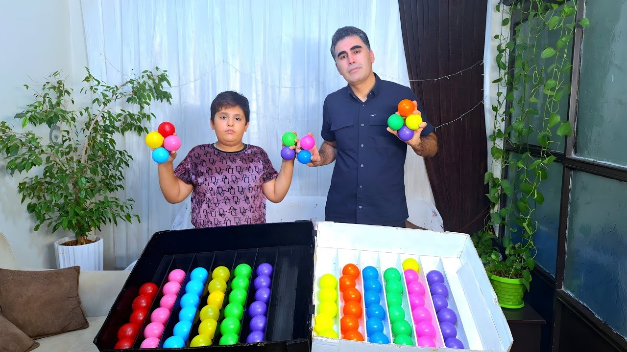 Happy moments of father and son in the relaxing game of sorting colored balls  🎮🔵🔴🟢🟡