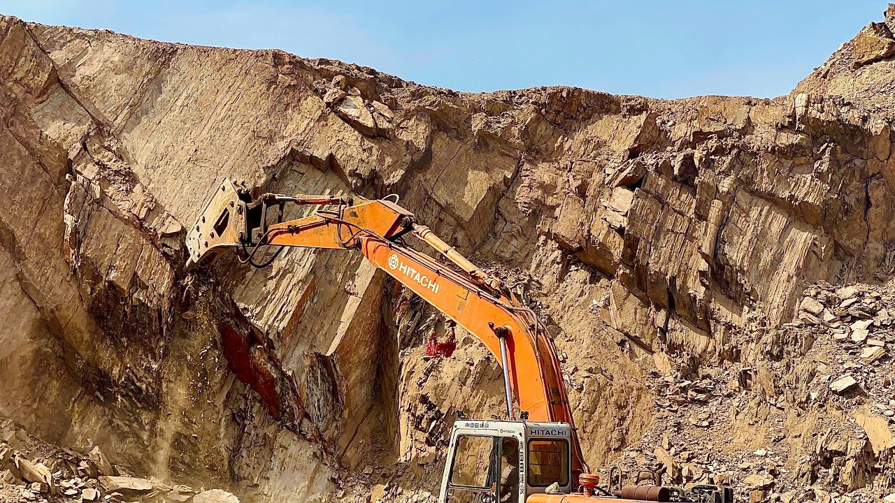 HEAVY MACHINERY IN ACTION: Excavator Humming and Drilling