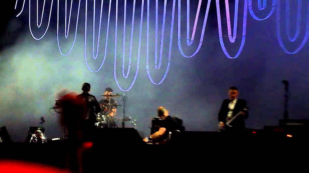 Jamie Cook without guitar during 'Dancefloor' into 'Library Pictures' at Rock Werchter 2014