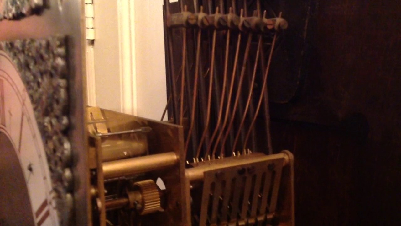 Triple chime grandmother clock