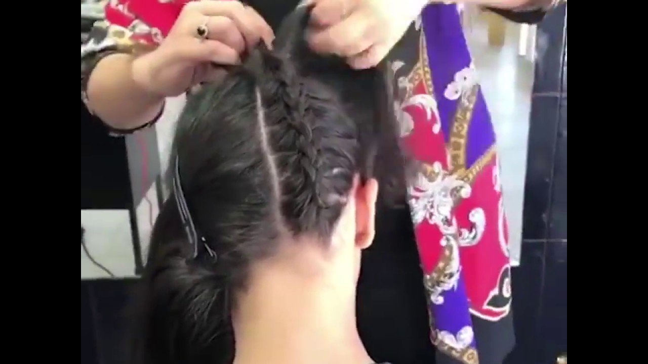 Double braided bun By natalieannehair...