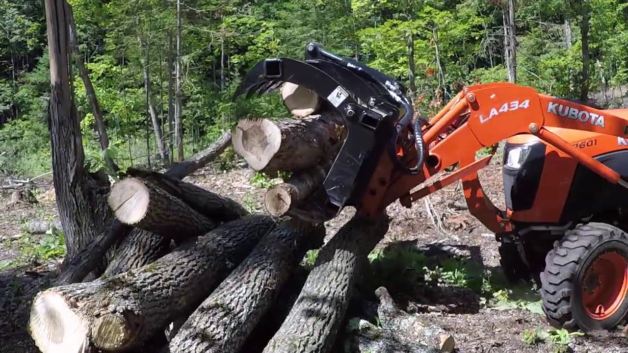 #307 Kubota B2601 Compact Tractor. Grapple, Chipper, Chainsaws and Wasps. outdoor channel.