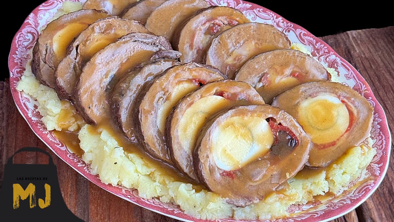 Ternera en salsa rellena de huevo, jamón y queso