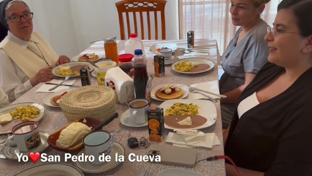 Favian Lameda prepares breakfast at his home for the missionary sisters, Daughters of St. Pius X.