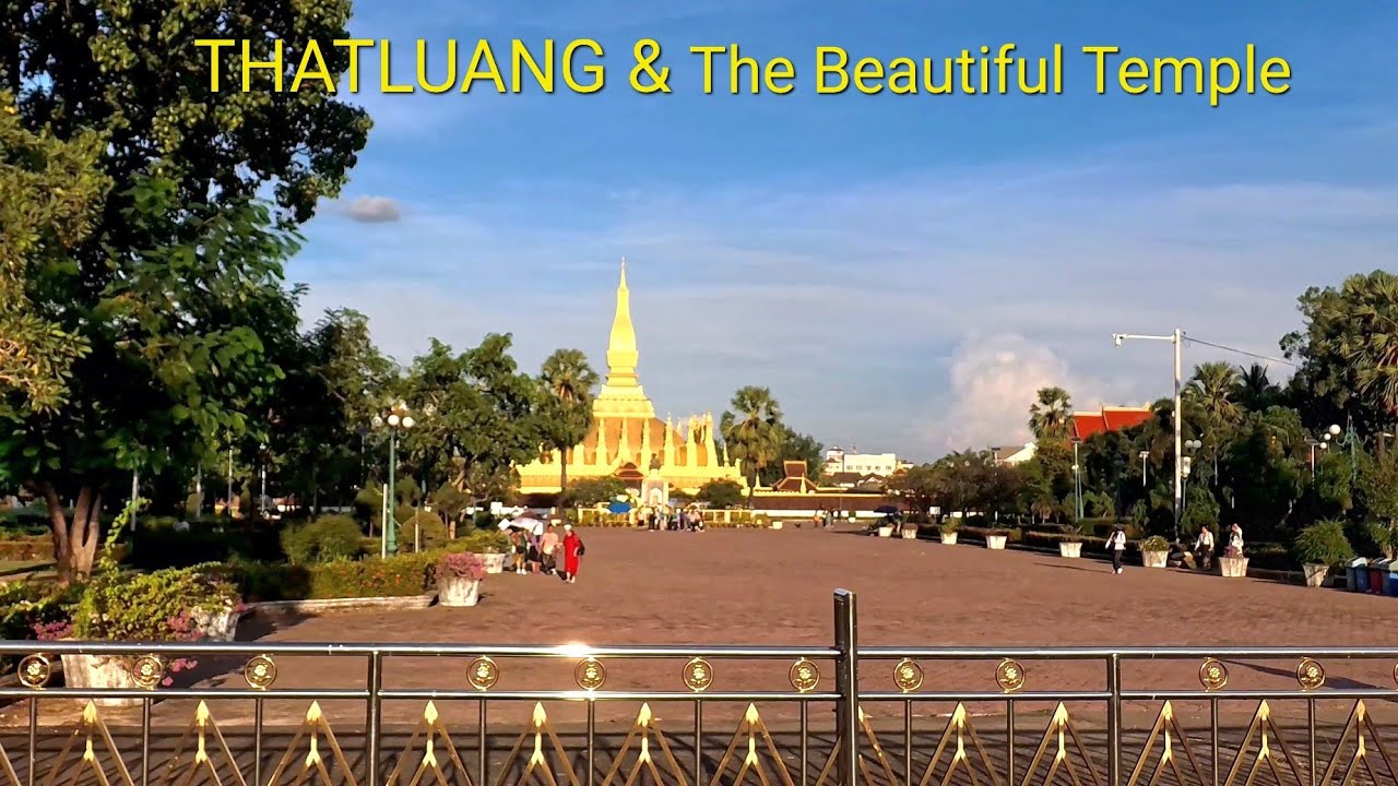 Visiting Thatluang stupa and The beautiful temple in Laos