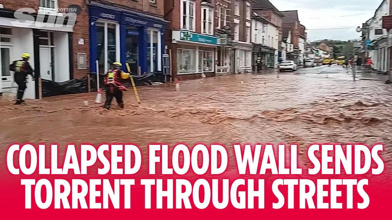 'Everyone get back' shouted as water surges through village streets after flood wall collapses