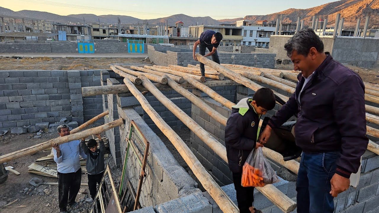 Nomadic Life: Mounting the Hut’s Roof Logs with the Help of Fereshteh’s Father and Friends